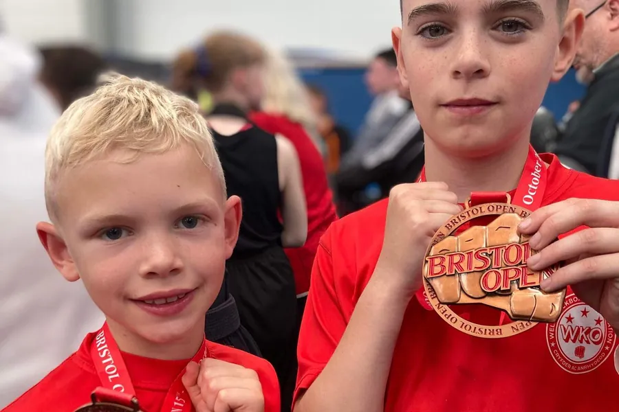 Two WKO Llanelli juniors with their Bristol Open medals